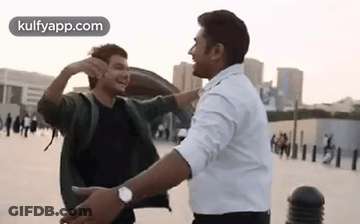 Two Men Hugging And Laughing GIF