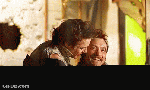 Two Men Hugging And Smiling GIF