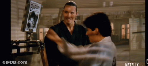 Two Men Hugging Badboy Sign GIF