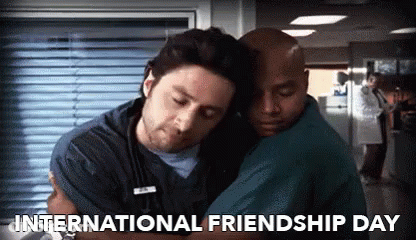 Two Men Hugging Each Other In A Hospital With The Words International Friendship Day Below Them GIF