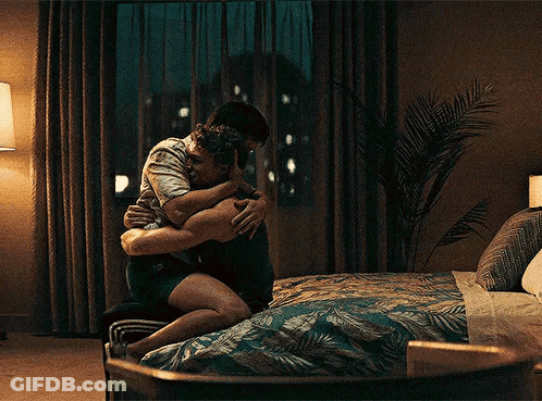 Two Men Hugging In Bedroom GIF