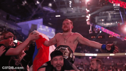 Two Men Hugging In Boxing Ring Russian Airlines GIF