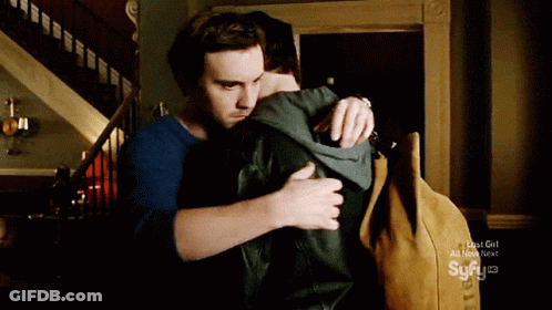 Two Men Hugging Lost Girl All New Next Sign GIF