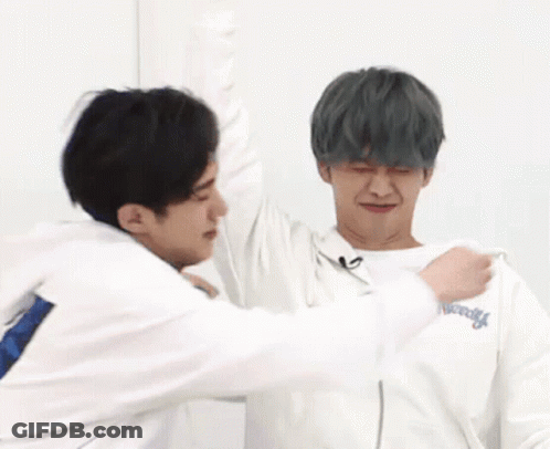 Two Men Hugging One Wearing New York Sweatshirt GIF