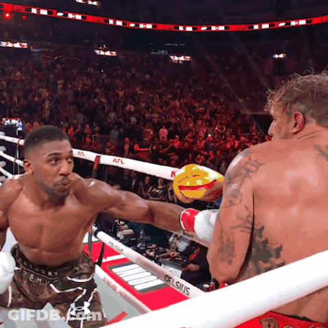 Two Men In A Boxing Ring With A Sign That Says Celsius On It GIF