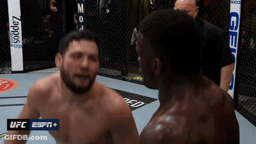Two Men In A Boxing Ring With The Ufc Espn Logo Visible GIF