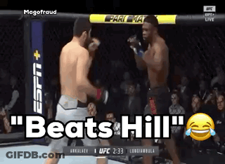 Two Men In A Boxing Ring With The Words " Beats Hill " GIF