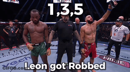 Two Men In A Boxing Ring With The Words Leon Got Robbed Below Them GIF