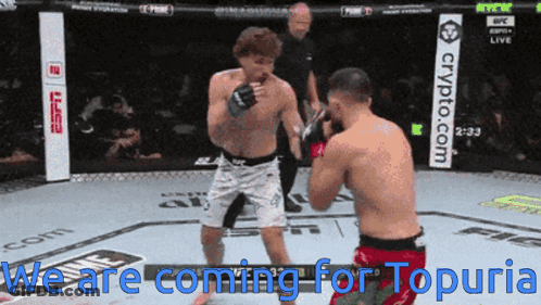 Two Men In A Boxing Ring With The Words We Are Coming For Topuria Above Them GIF
