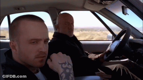 Two Men In A Car One With A Tattoo On His Wrist GIF