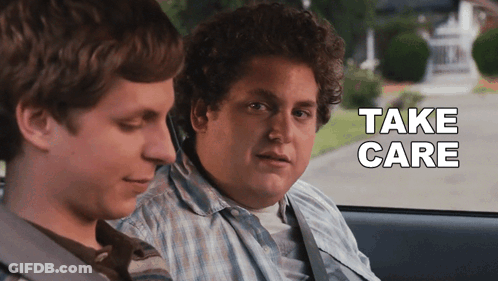 Two Men In A Car With The Words Take Care Written On The Screen GIF