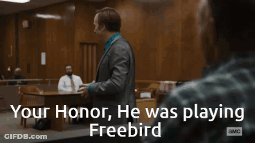 Two Men In A Courtroom With The Words " Your Honor He Was Playing Freebird " On The Bottom GIF