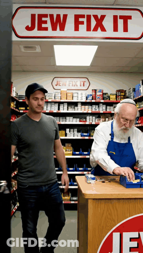 Two Men In A Jew Fix It Store With A Sign Above Them GIF