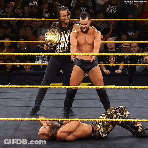 Two Men In A Wrestling Ring With One Wearing A Shirt That Says Jay Gold On It GIF