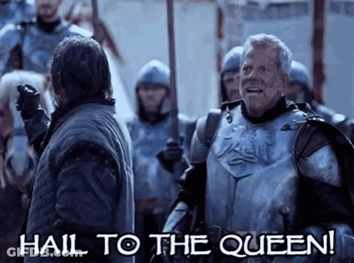 Two Men In Armor Are Standing Next To Each Other And One Of Them Is Saying Hail To The Queen GIF