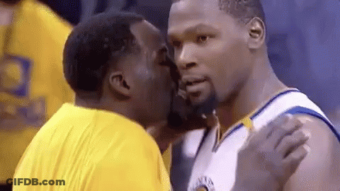 Two Men In Basketball Uniforms Kissing GIF