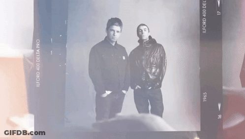 Two Men In Black And White Photo 1945 GIF