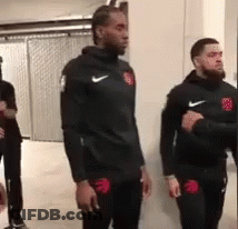 Two Men In Black Nike Jackets GIF
