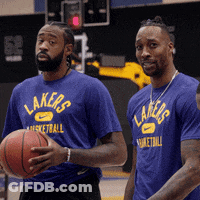Two Men In Blue Lakers Shirts Holding Basketballs GIF