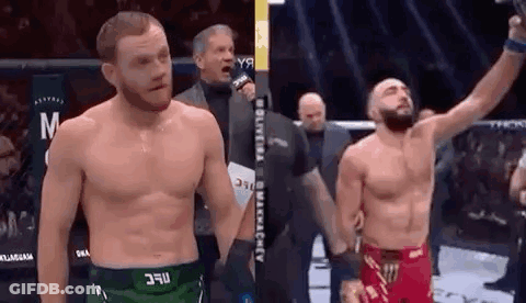 Two Men In Boxing Ring Celebrating GIF