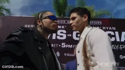 Two Men In Boxing Ring One Wearing Crown GIF
