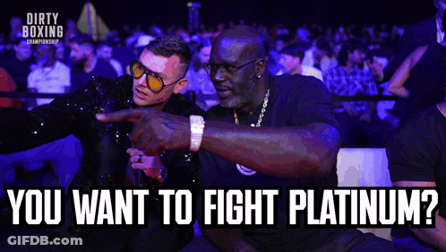 Two Men In Boxing Ring Pointing GIF