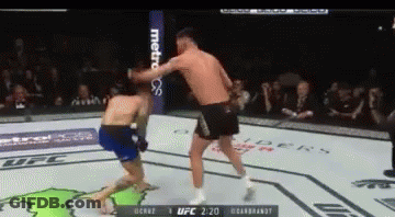 Two Men In Boxing Ring With Metropcs Banner GIF