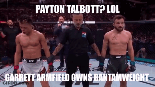 Two Men In Boxing Ring With Referee GIF