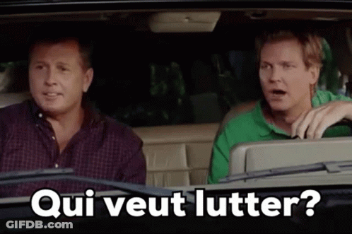 Two Men In Car Asking Qui Veut Lutter? GIF