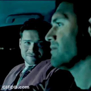 Two Men In Car Looking At Something GIF