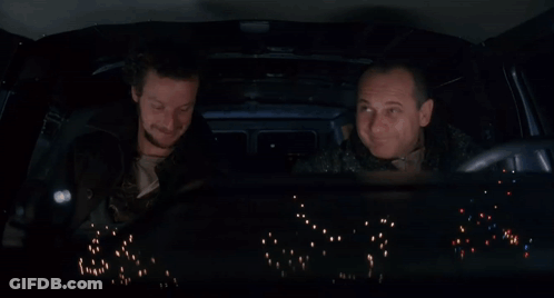 Two Men In Car Yellow Crow Bars Up GIF