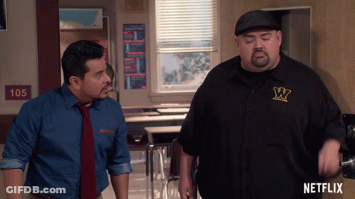 Two Men In Classroom With 105 Sign GIF