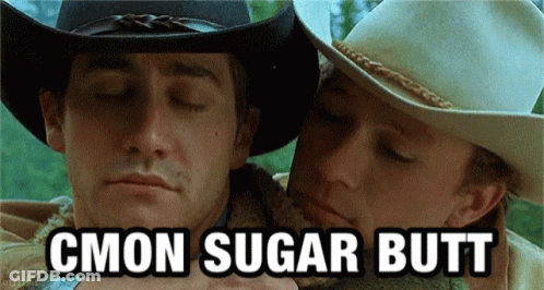 Two Men In Cowboy Hats Are Hugging Each Other With The Words Cmon Sugar Butt Written Below Them GIF