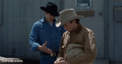 Two Men In Cowboy Hats Are Standing In Front Of An Office Door GIF