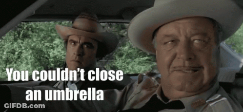 Two Men In Cowboy Hats In Car Saying You Couldn't Close An Umbrella GIF