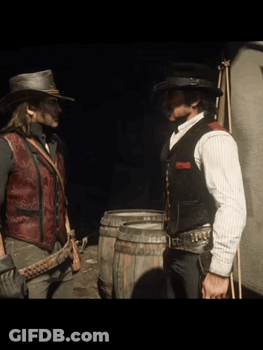 Two Men In Cowboy Hats Talking GIF
