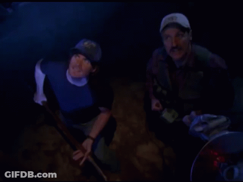 Two Men In Dark Room One Wearing Hat With 92 GIF