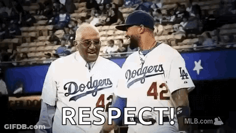 Two Men In Dodgers Jerseys Shaking Hands GIF