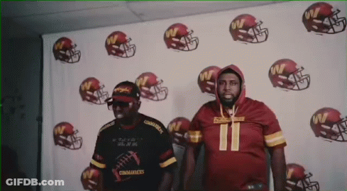 Two Men In Football Helmets Number 11 GIF