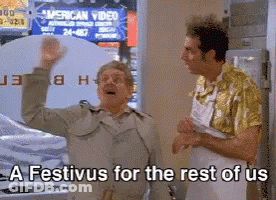 Two Men In Front Of A Sign That Says American Video GIF