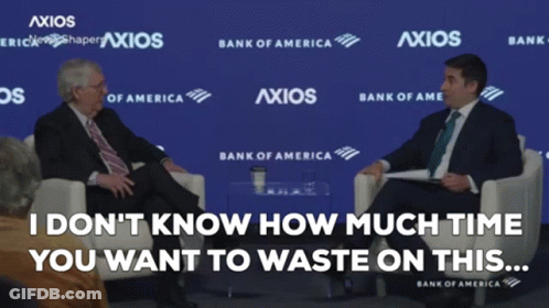 Two Men In Front Of Bank Of America Sign GIF