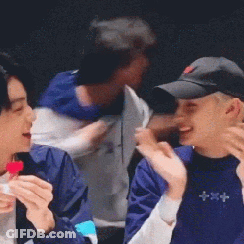Two Men In Front Of Mirror One Wearing Tomorrow Shirt GIF