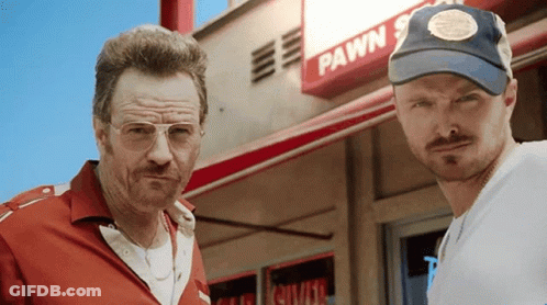 Two Men In Front Of Pawn Store GIF
