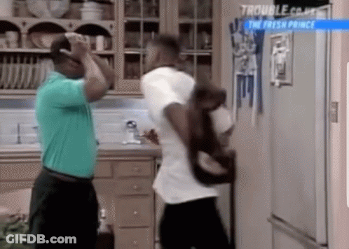 Two Men In Front Of Refrigerator With Sign Saying The Fresh Prince GIF