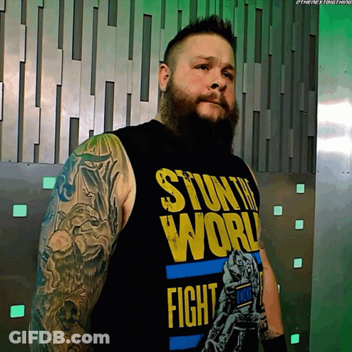 Two Men In Front Of Wall Saying Same GIF