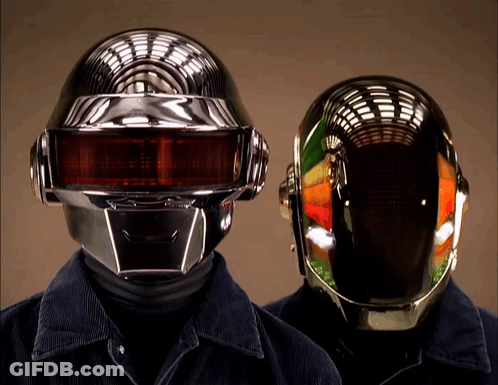 Two Men In Futuristic Helmets GIF