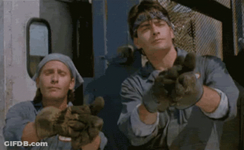 Two Men In Gloves Making Peace Sign GIF