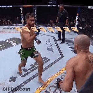 Two Men In Green Shorts Fighting GIF