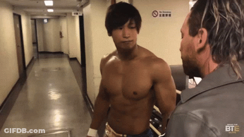 Two Men In Hallway With No Smoking Sign GIF