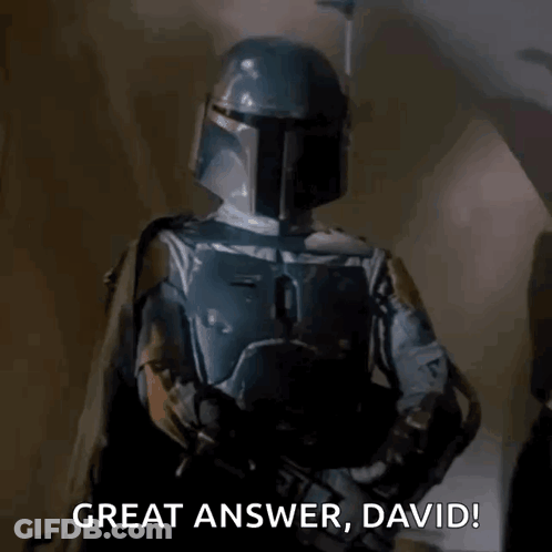 Two Men In Helmets Holding Guns GIF